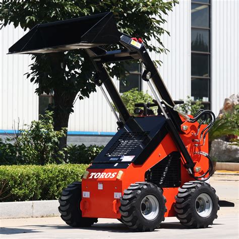 standing mini skid steer|stand behind mini skid steer.